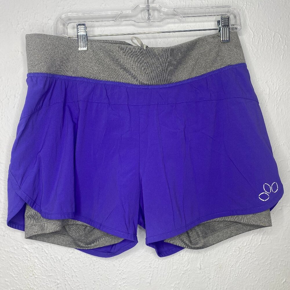 REI, women's size L, purple/grey Compression Fleet shorts, EUC.